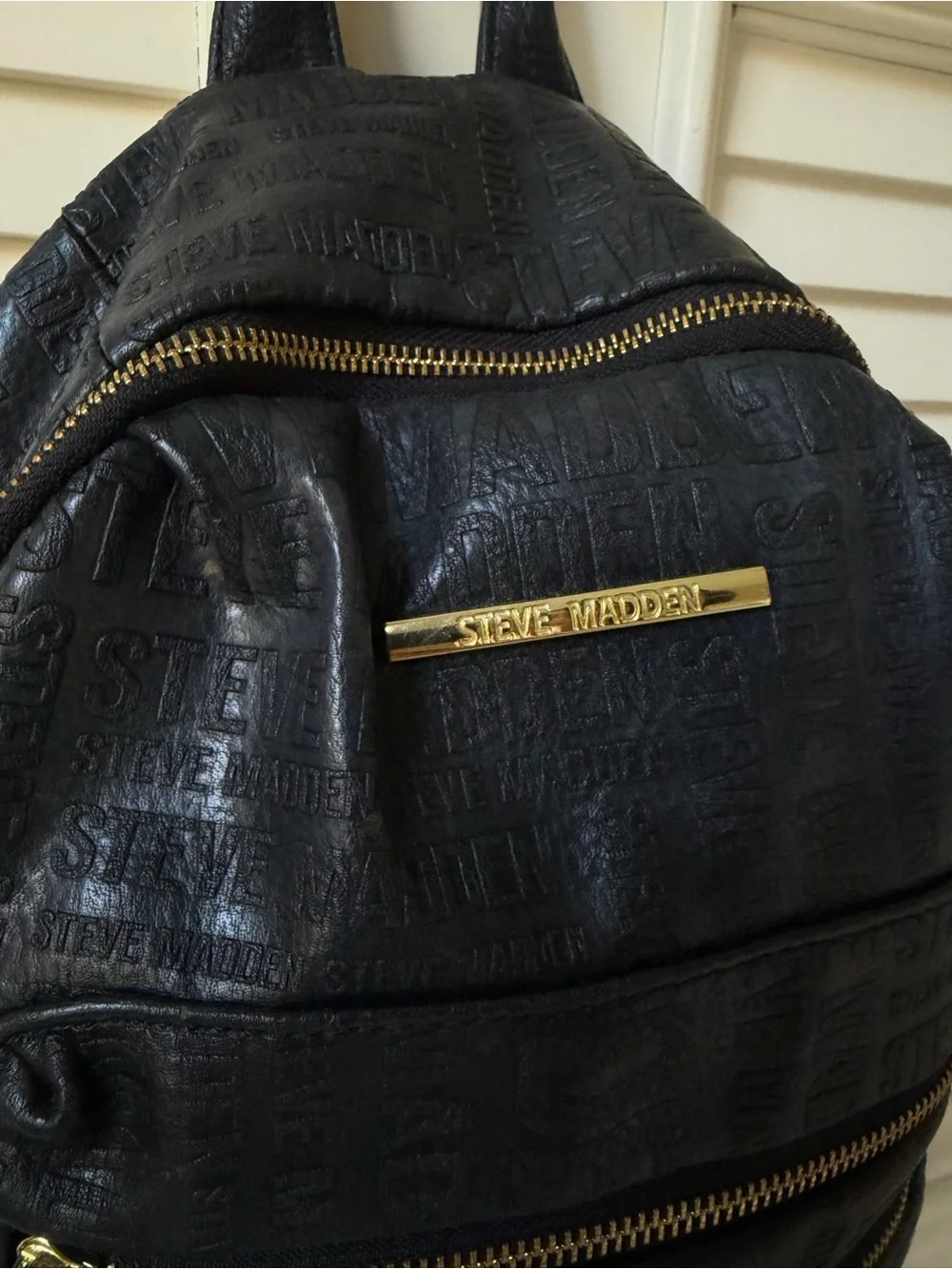 Steve Madden Black Embossed Mini Backpack with Gold Zippers